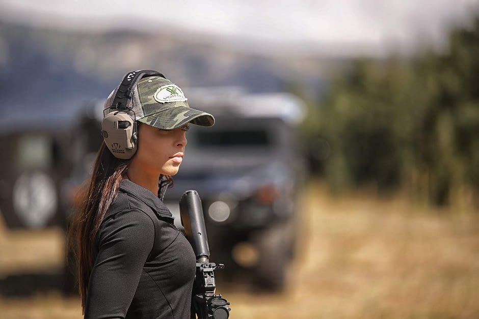 Attractive Woman with Walkers Headset and AR15